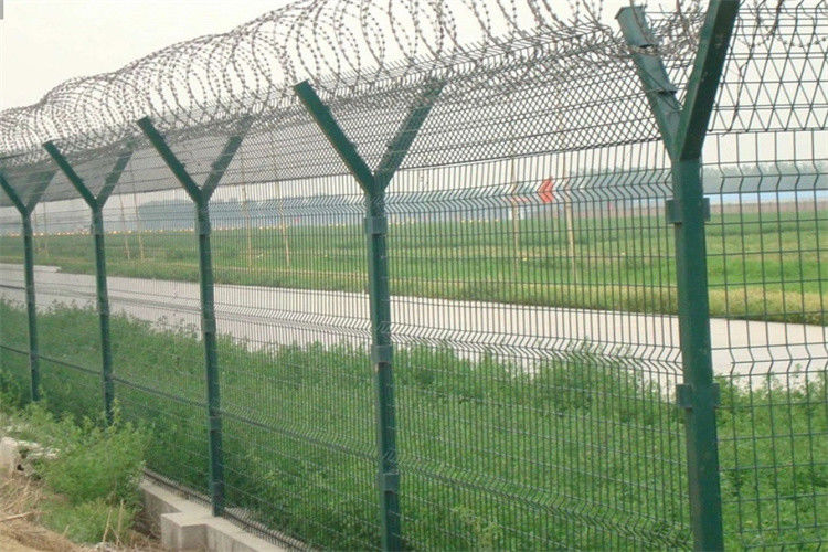 High Security Concertina Razor Wire On The Top Of Airport Perimeter Security Fencing